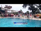 Watch Coach Gary Andersen take a belly flop at Goodman Pool