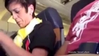 Man films woman sleeping on his lap during flight
